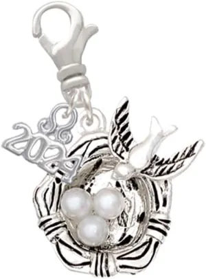 Delight Jewelry Silvertone Birds Nest with Imitation Pearl Eggs - Clip on Charm with Year 2024