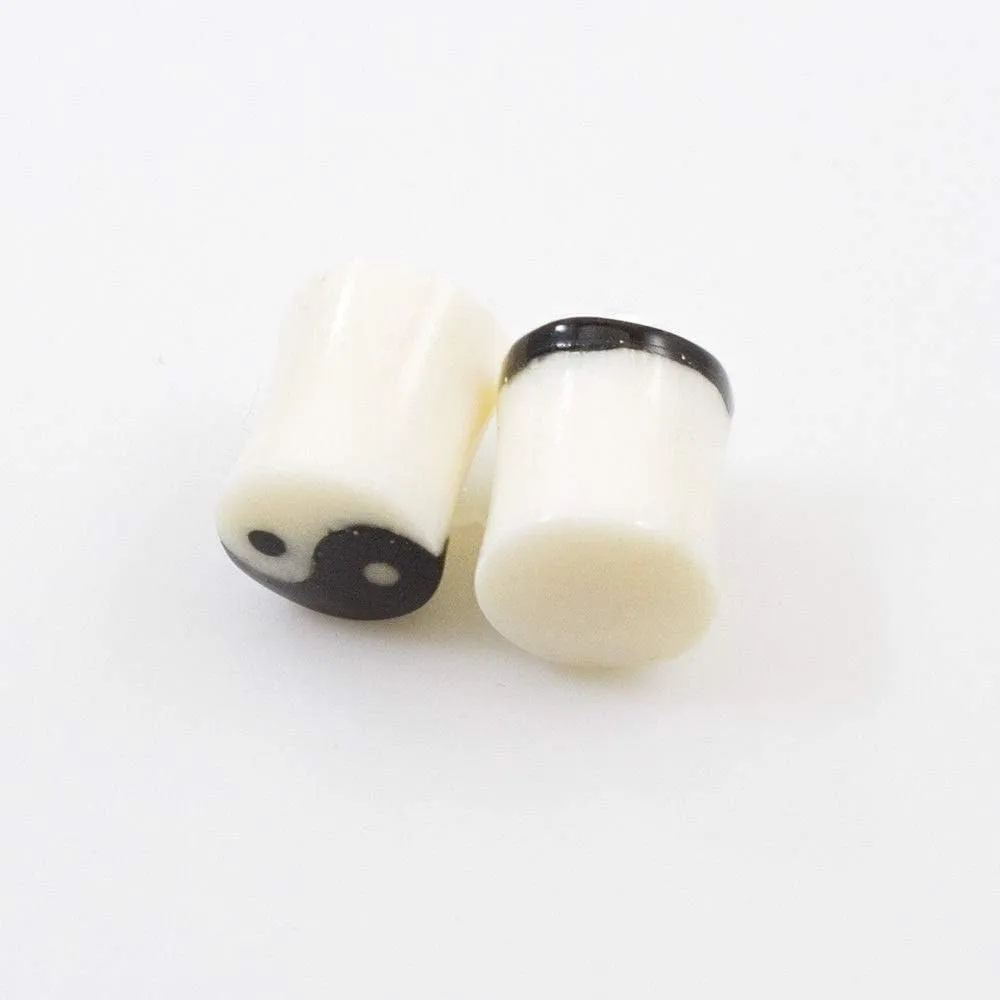 Pair of Ear Plugs Made of Organic Horn Bone with Yin Yang Symbol Design